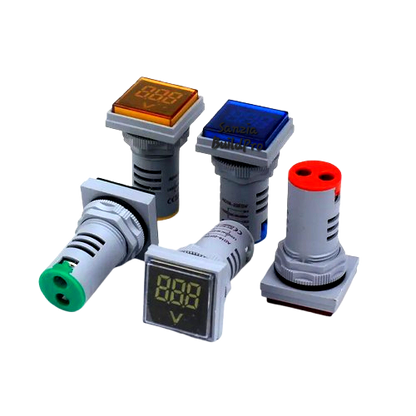 Set of digital voltage indicators with different colored displays on a white background